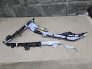 Шторка безопасности левая Toyota Camry 70 (XV70) 73220-0E030 в руках комплектовщика