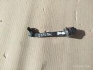 Передний левый ограничитель двери Toyota Corolla E210 2020- артикул 68610-02350 на замасляном стеллаже